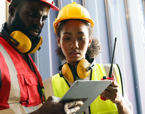 Foreman control Industrial Container Cargo freight ship at industry. Transportation and logistic.