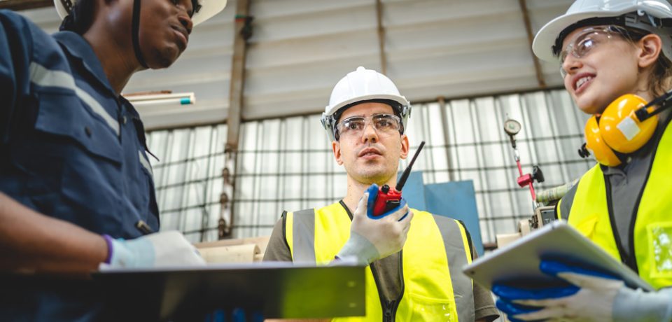 Testing new automation innovation tool for smart industrial, Professional robotic engineers specialist maintenance and control robot arm in factory warehouse, technician teamwork working together